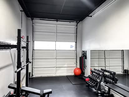 Hustle Gym training floor and equipment setup.